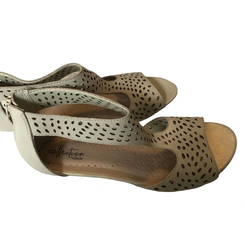 Collection by Clark’s. Abigail Ruby in Ivory. Perforated leather‎ wedges. 8.5